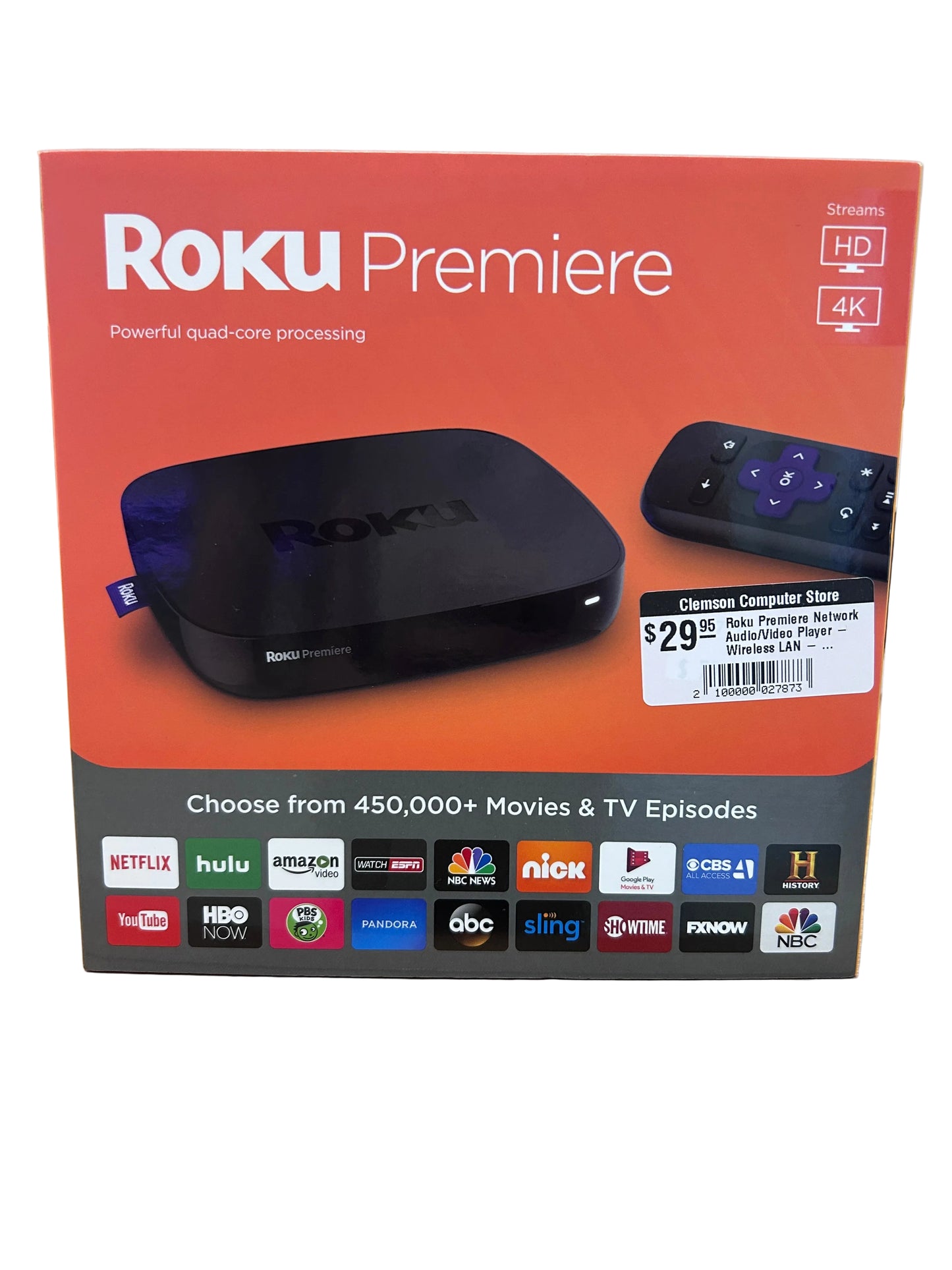 Roku Premiere streaming device retail box, showing the black streaming box and remote on a red-orange front panel with app logos along the bottom.
