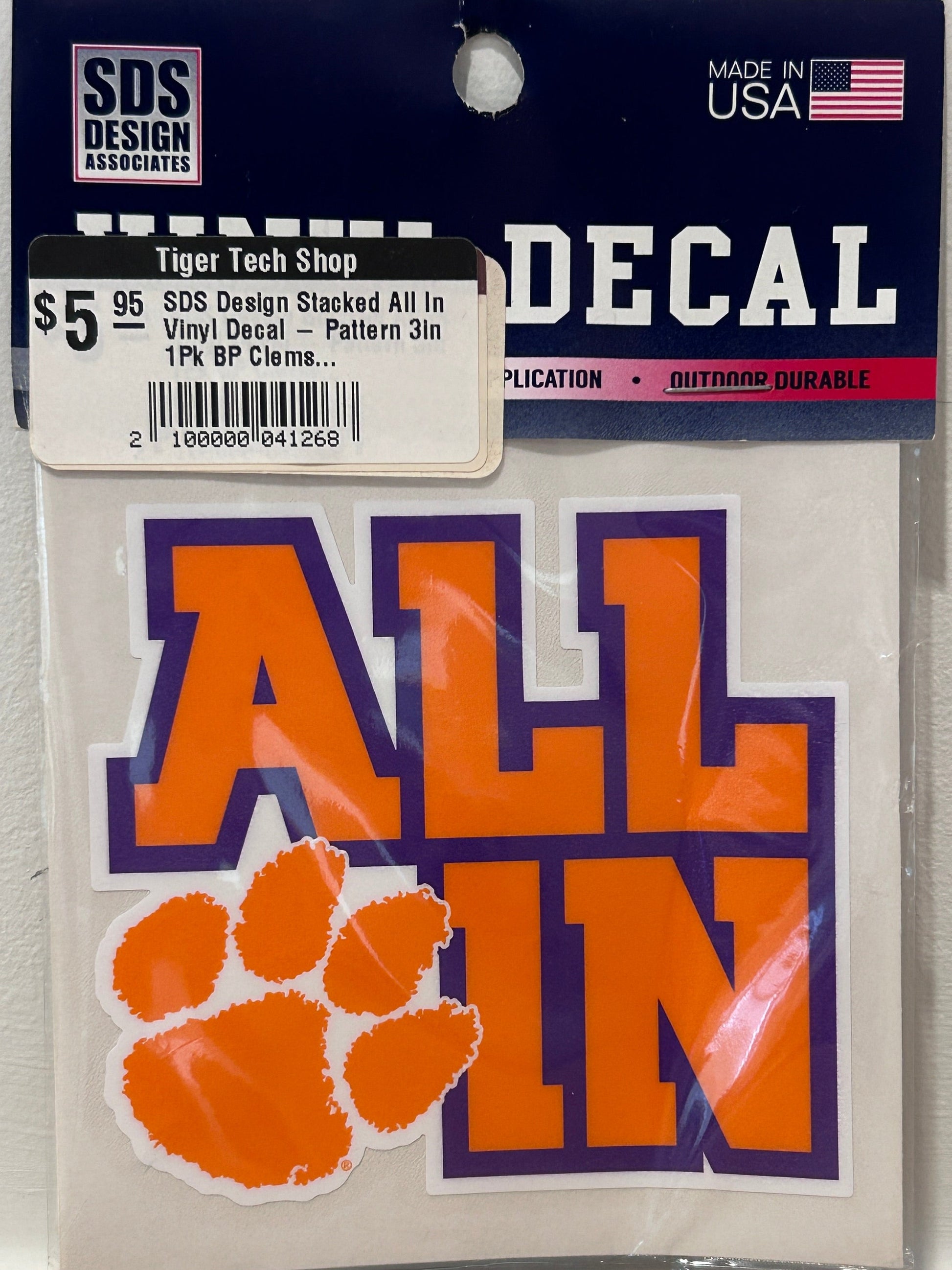 The sticker features the word 'ALL IN' in orange with a purple outline and a matching orange paw print.