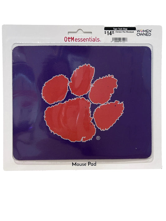 Purple mouse pad with a orange tiger paw in the middle outlined in white